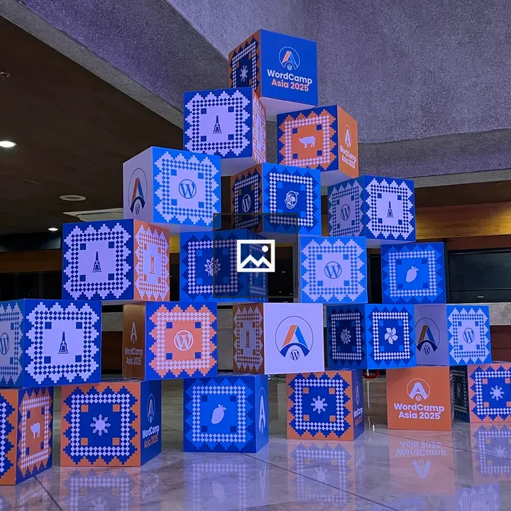Stack of Boxes with WordCamp Logo