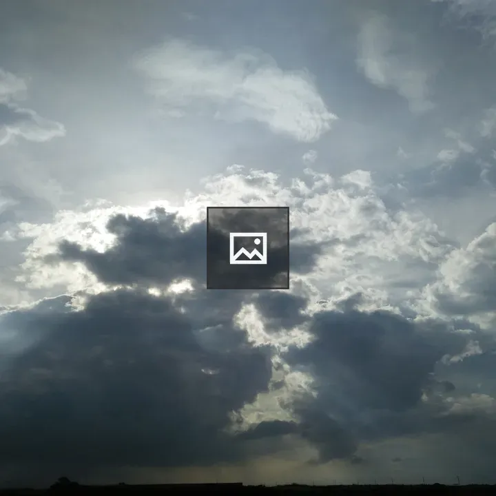 Sunbeams Through Clouds Over Dhaka