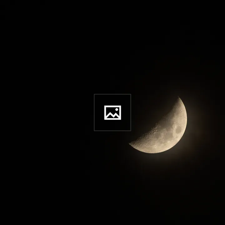 Crescent Moon Behind Fog