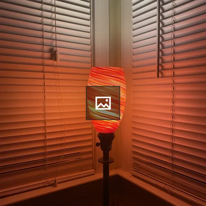 Red swirled glass table lamp