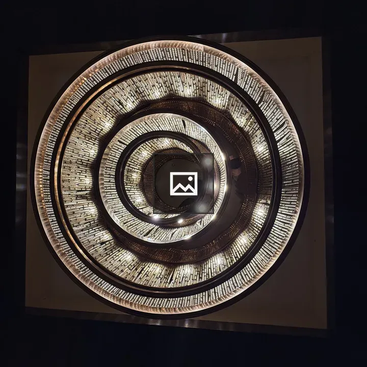 Ceiling spiral of illuminated tiles