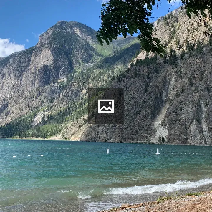 Beach scene with mountain backdrop