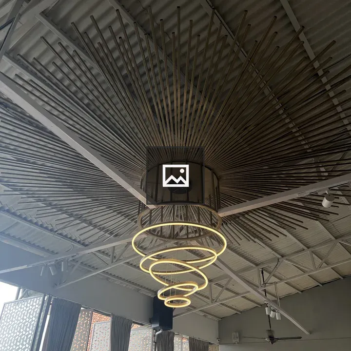 Swirling gold light fixture