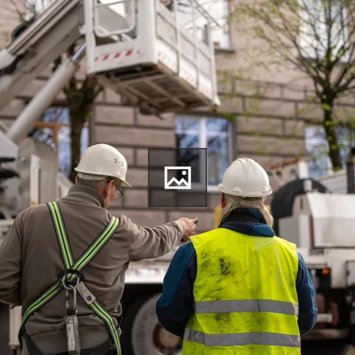 Construction workers and truck