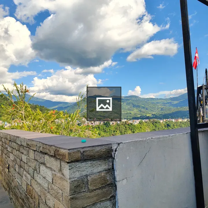 Wall in Mountain Town Scene