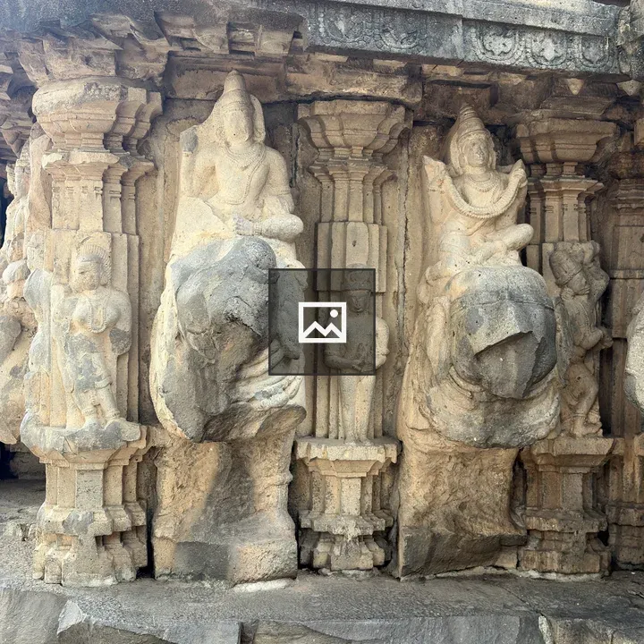 Carved stone sculpture with deities