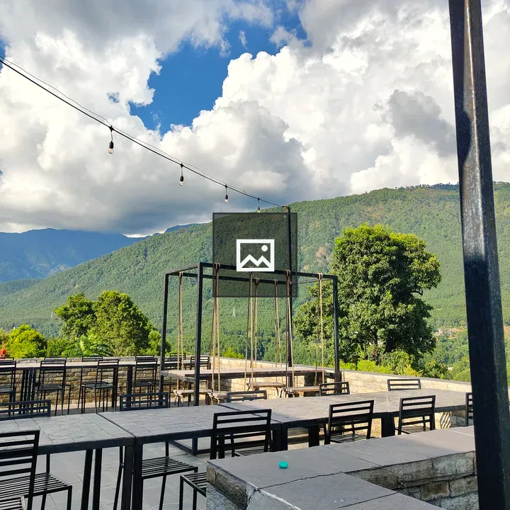 Outdoor dining area with mountains