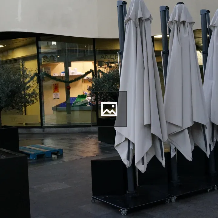 Row of closed umbrellas