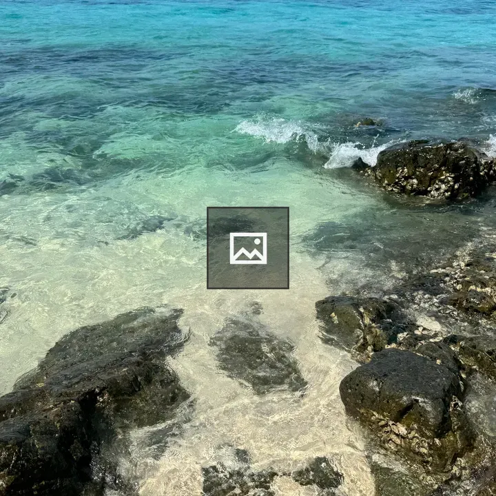Clear turquoise water at rocky shore