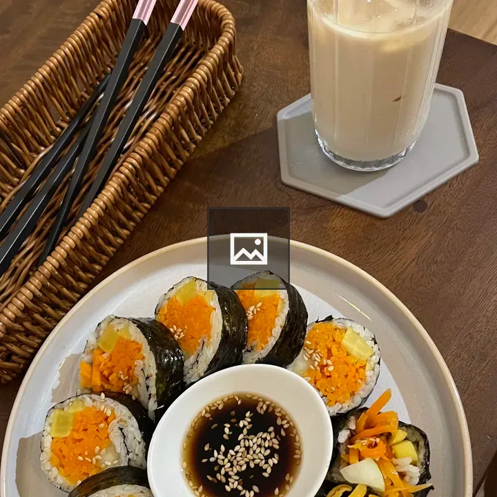 Top-down kimbap with soy sauce bowl