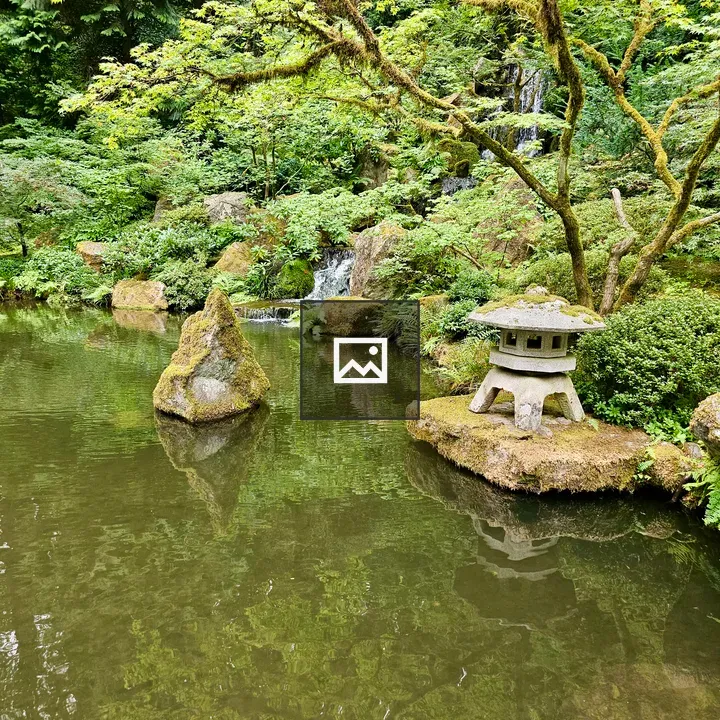 Stone lantern near pond