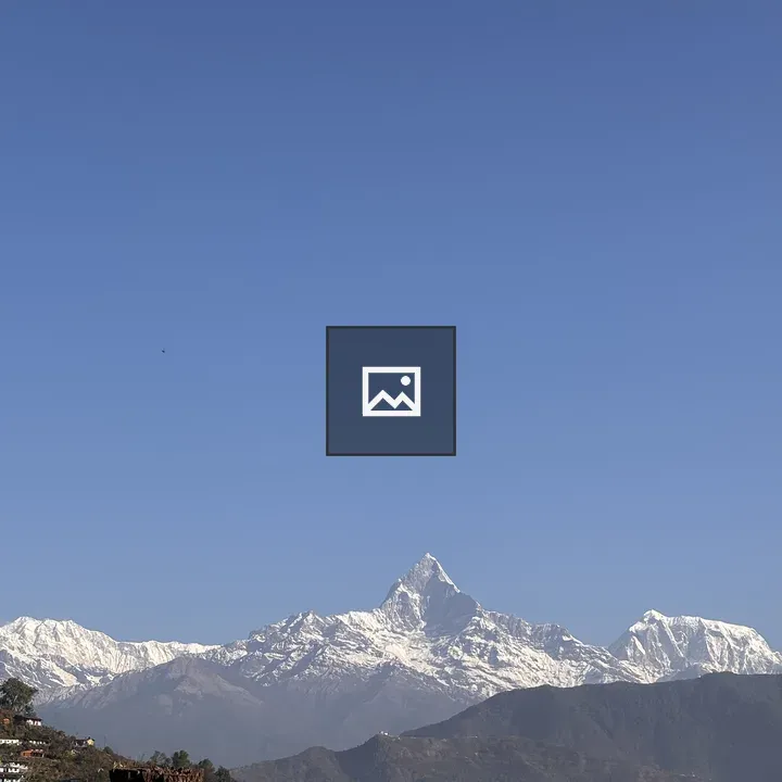 Snow-capped Mountains and Town Scene