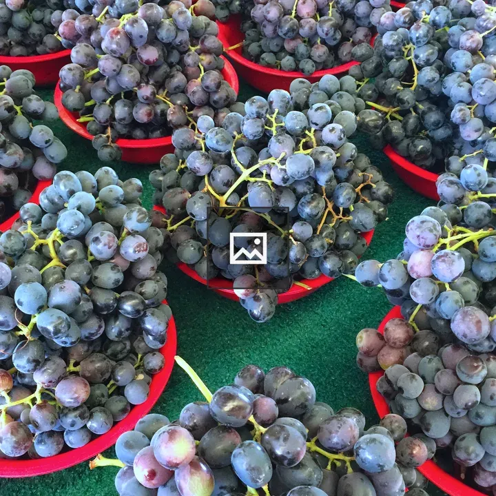 Bowls Of Grapes At The Market