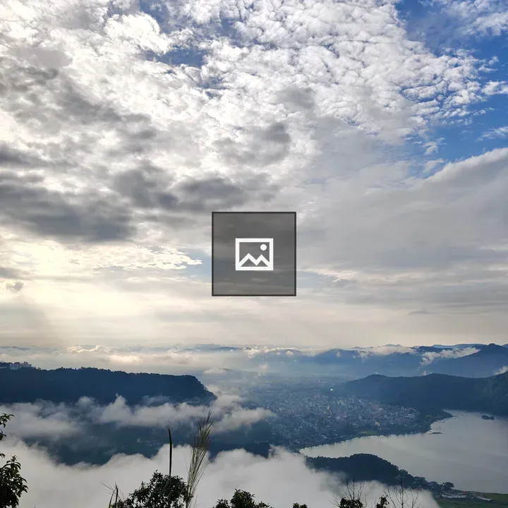 Panoramic hills, lake and city
