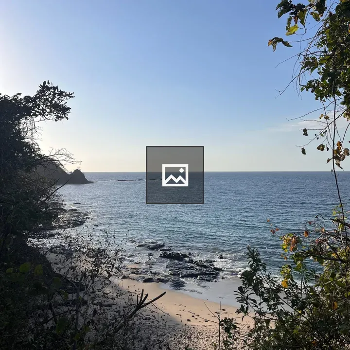 Coastal Beach with Rocky Outcrops