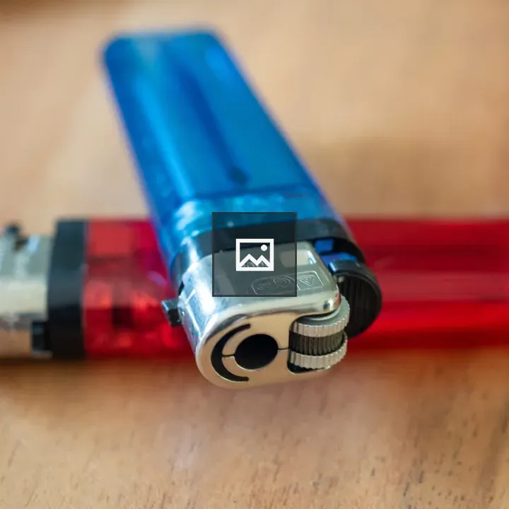 Macro shot of blue and red lighters