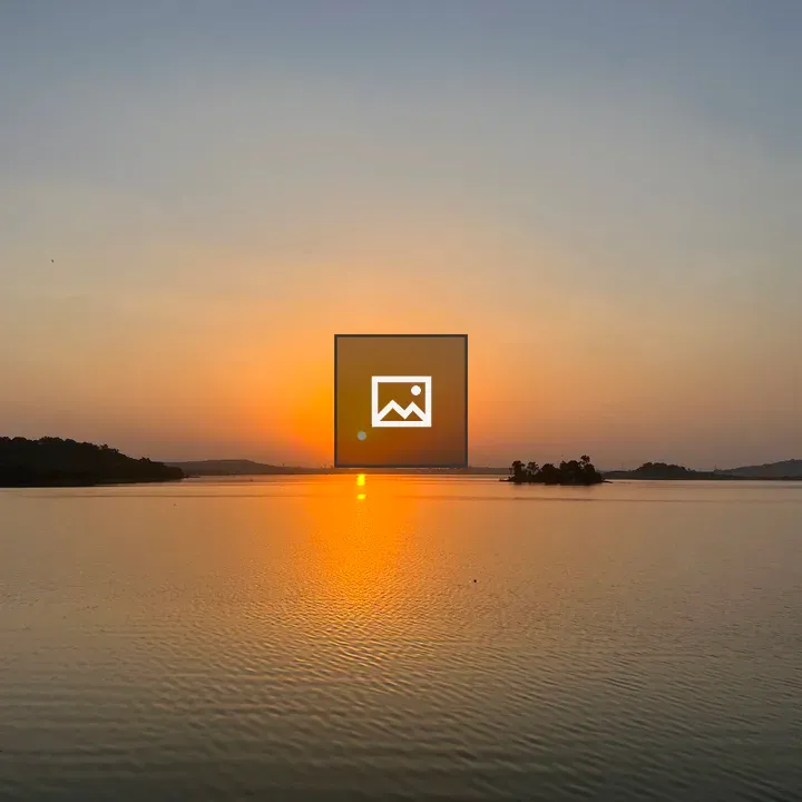 Sunrise over tranquil waters
