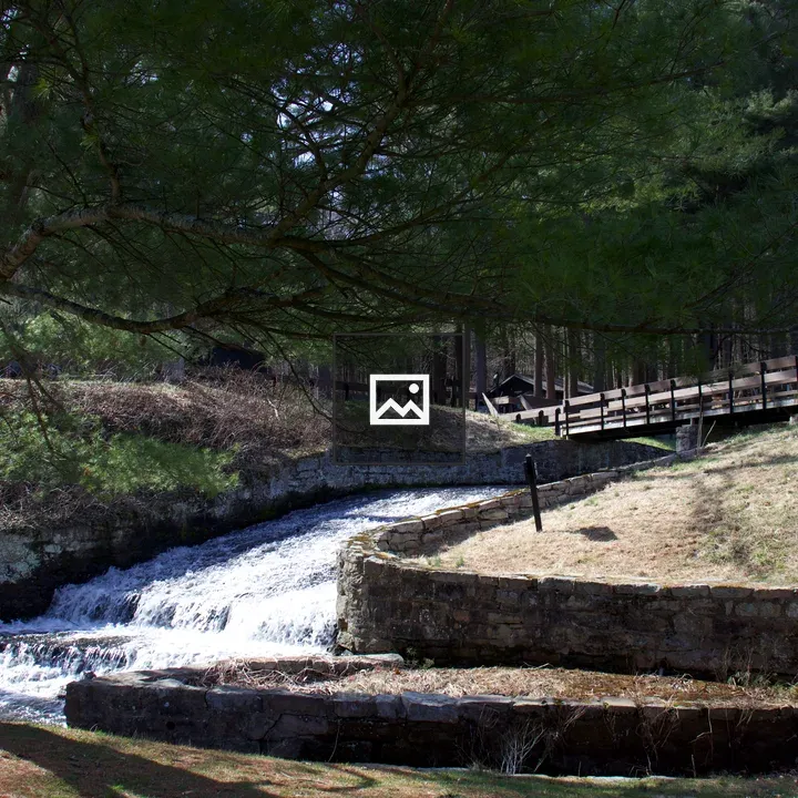 Waterfall under a bridge