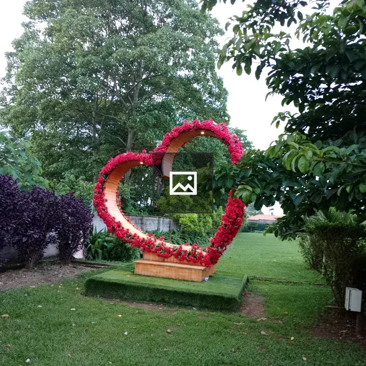 Wooden heart sculpture in garden