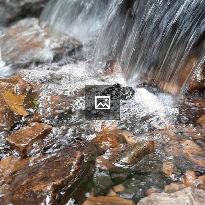 Clear stream over rocks in Chingaza