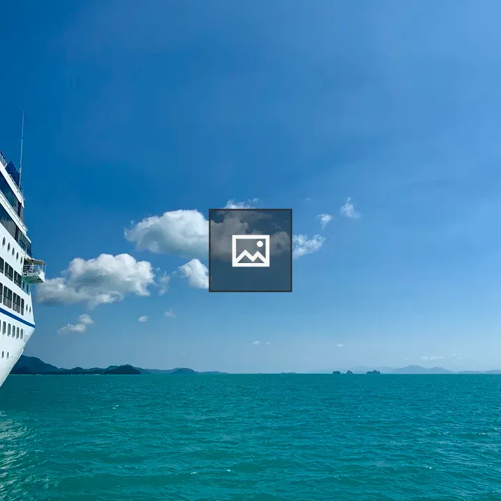 Cruise Ship Off Mountain Coast