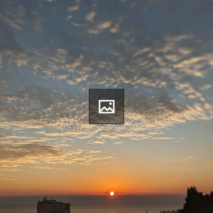 Sunrise Over Rooftops