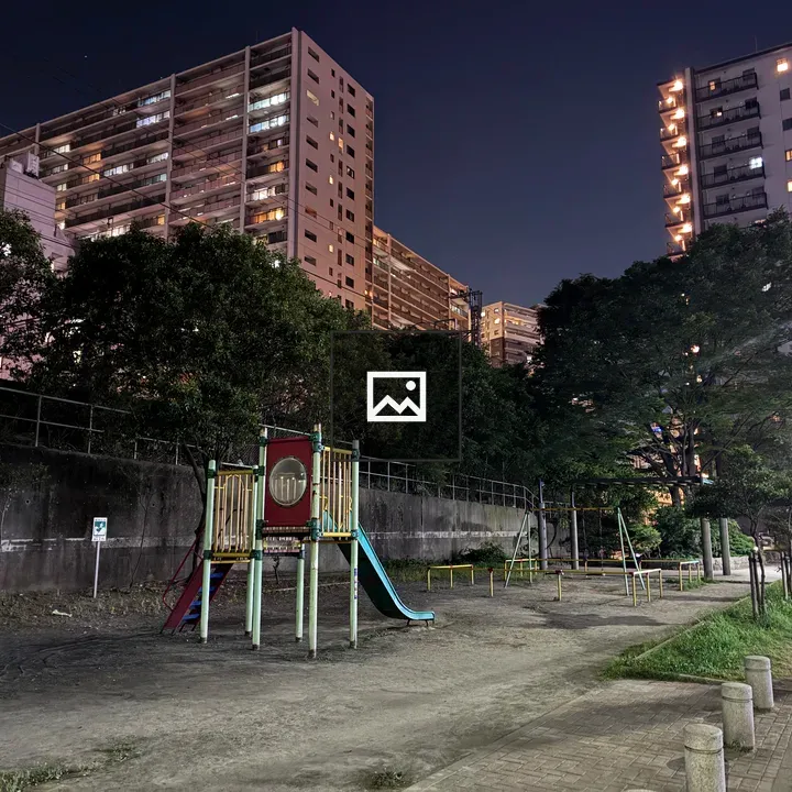 Nighttime Playground by Buildings