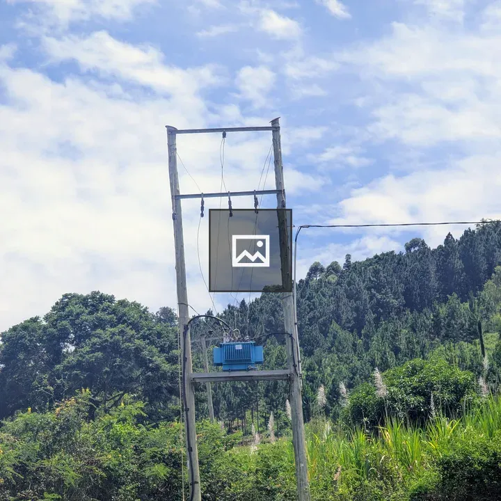 Electric transformer on wooden poles