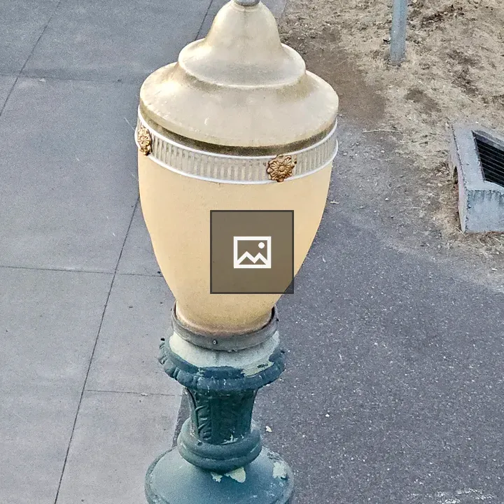 Classic streetlamp with peeling paint