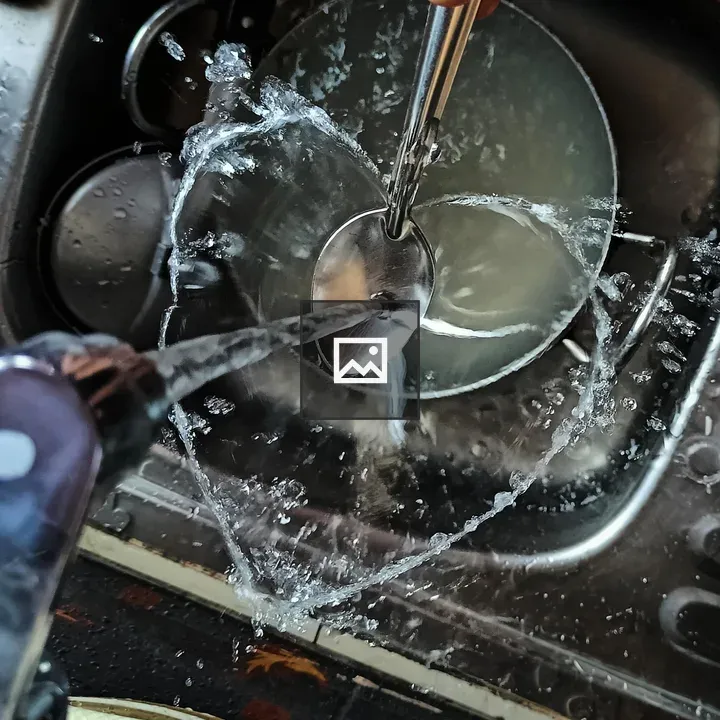 Close-up of Kitchen Sink with Water