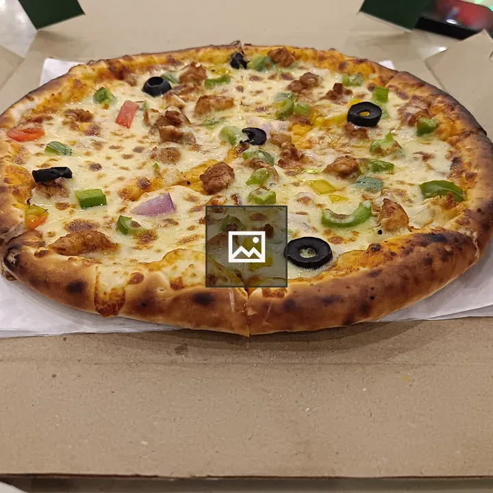 Pizza with toppings and peppers