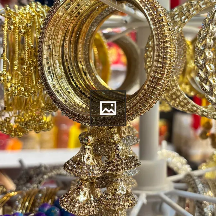 Gold bangles on stand