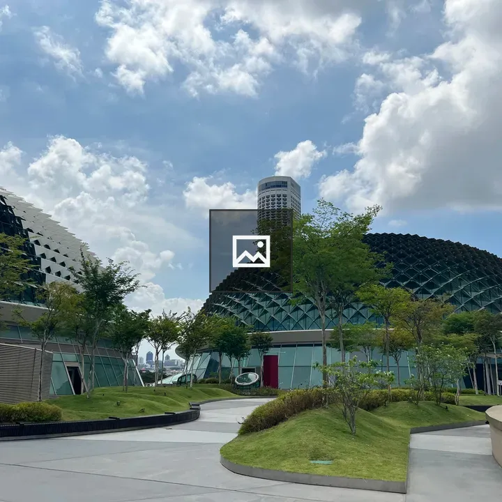 Modern building domes with trees