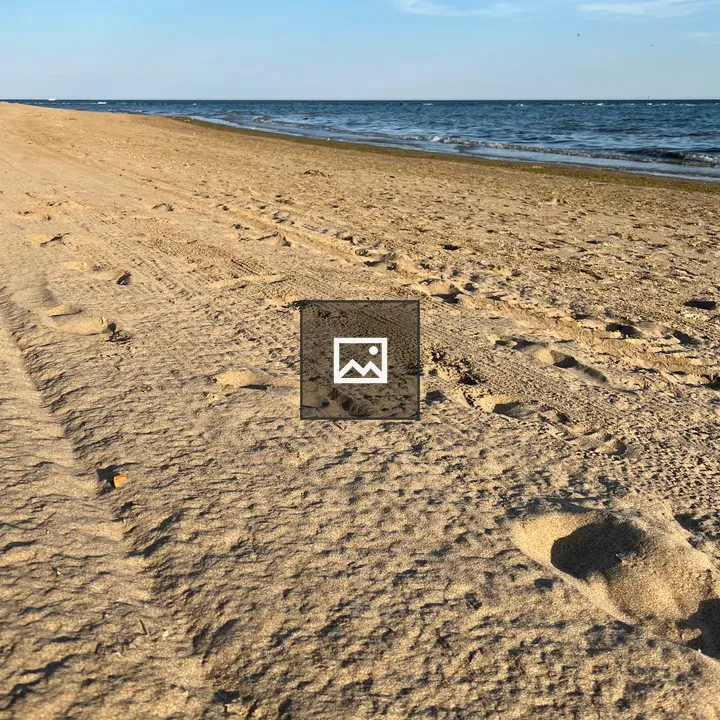 Beach Sand and Sea Horizon