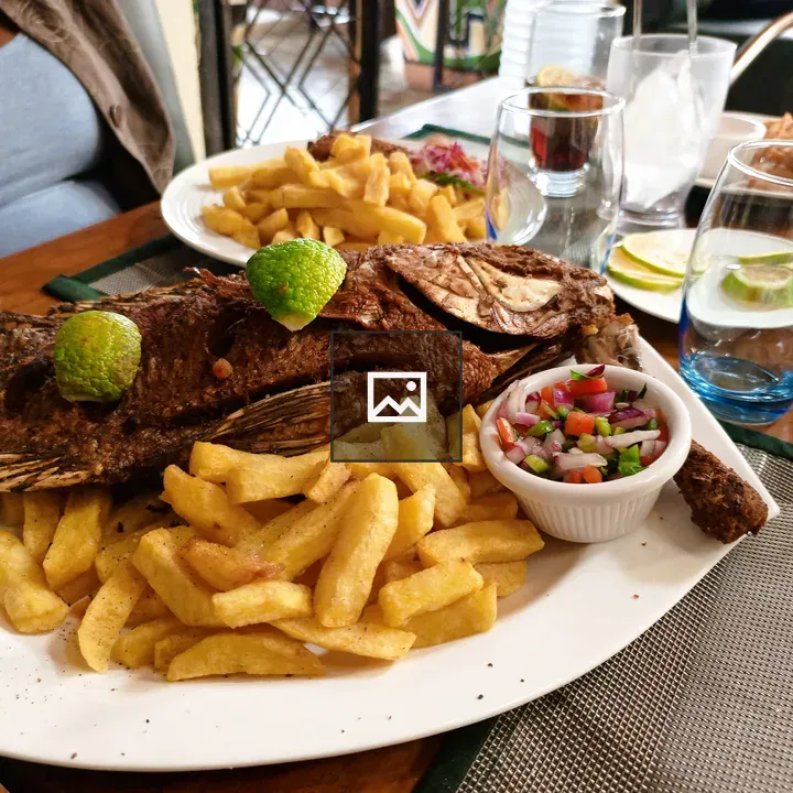 Grilled whole fish on platter