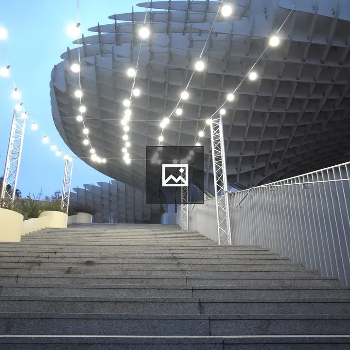 Trail of light to wooden structure