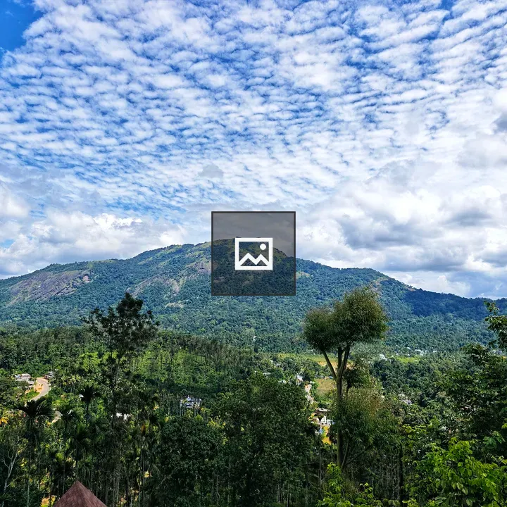 Mountain landscape with cloudy sky