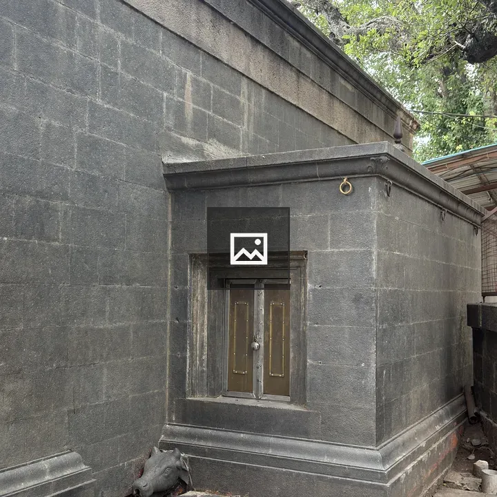 Stone temple facade with window
