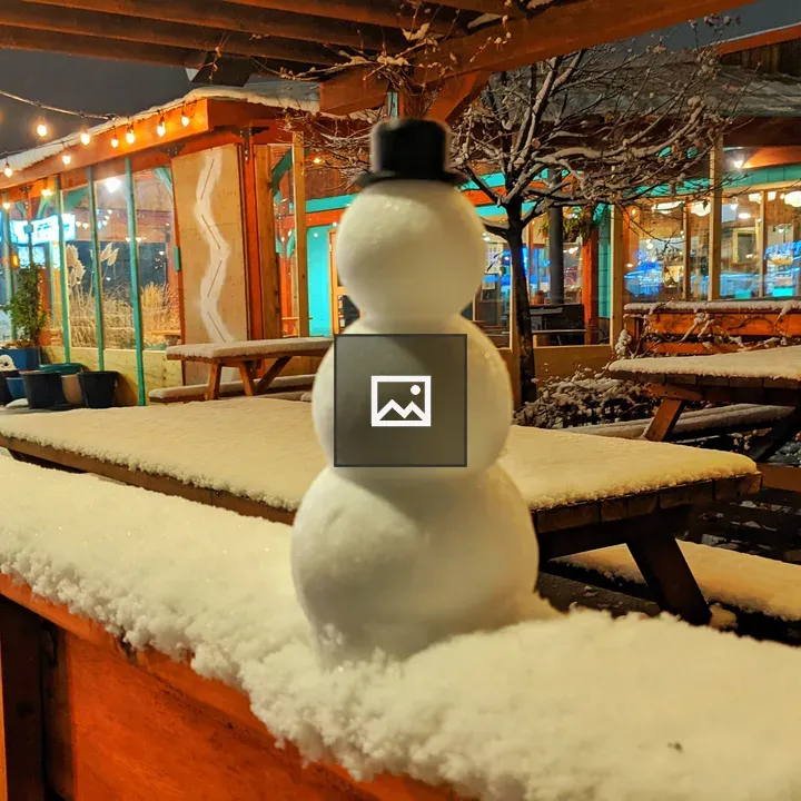 Snowman on Patio Rail