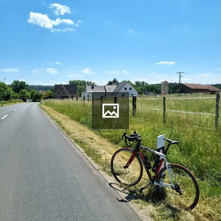 Racing bike by rural village