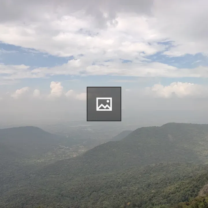 Panorama of Green Hills Under Sky