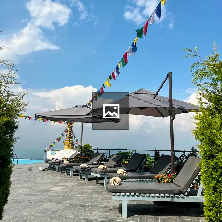 Lounge Chairs with Towels and Umbrellas