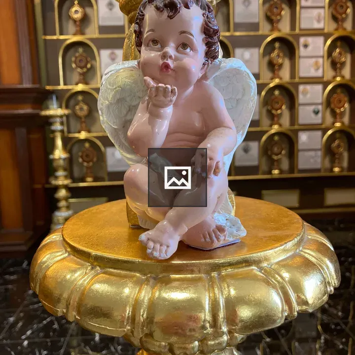 Cherub detail sculpture