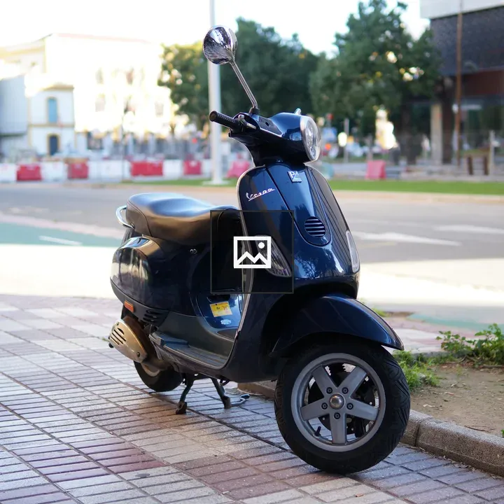 Dark blue motorcycle on street