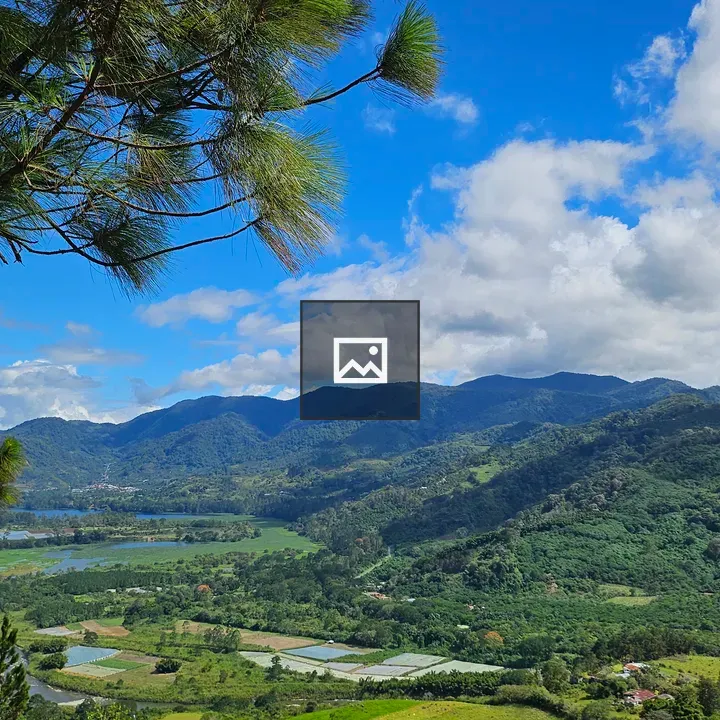 Valley with winding river and mountains