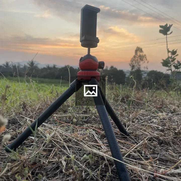 Tripod on Ground with Sunset