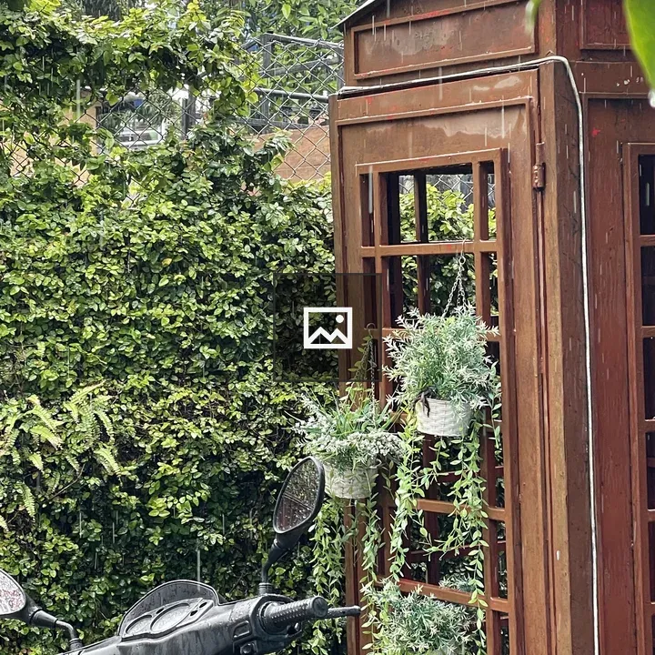 Vintage wooden booth in the rain