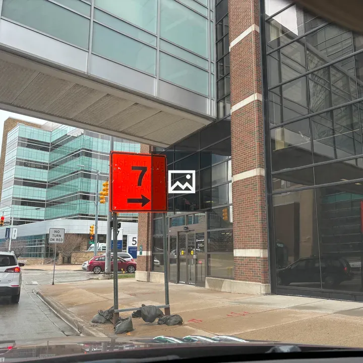 Orange construction sign with 7