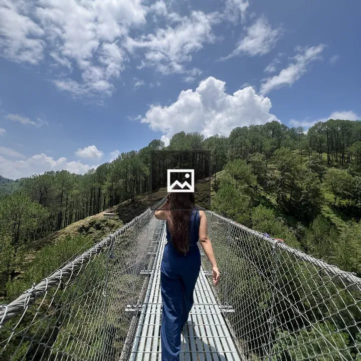 Girl on Suspension Bridge