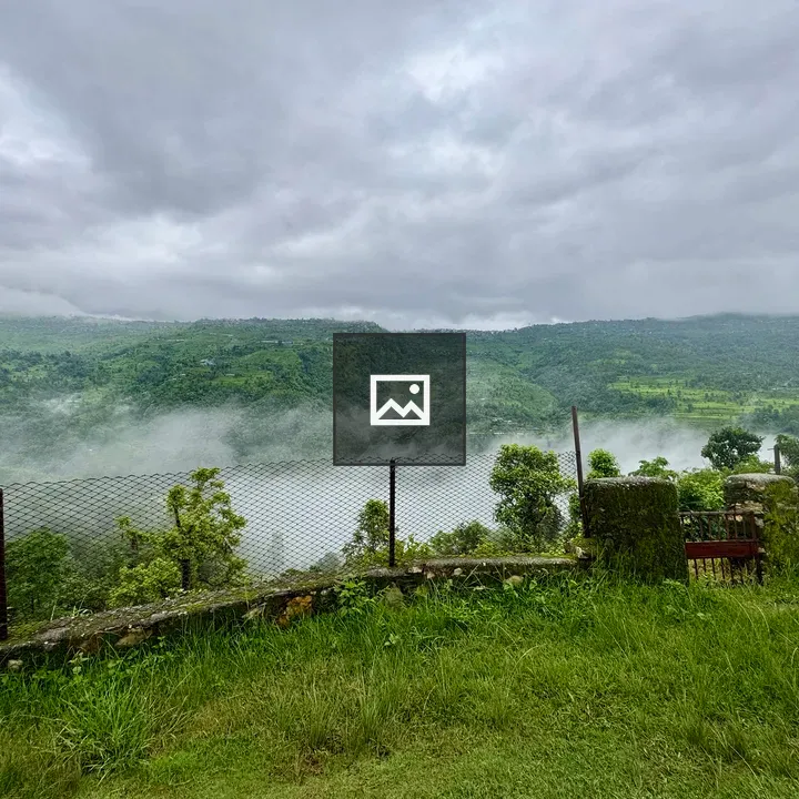 Green hills and cloudy sky